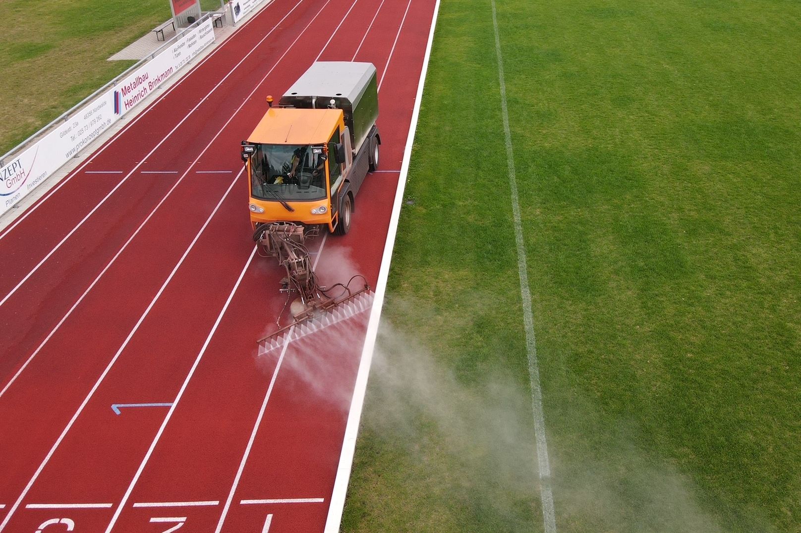 Intensive cleaning of Tartan tracks with our special cleaning machine