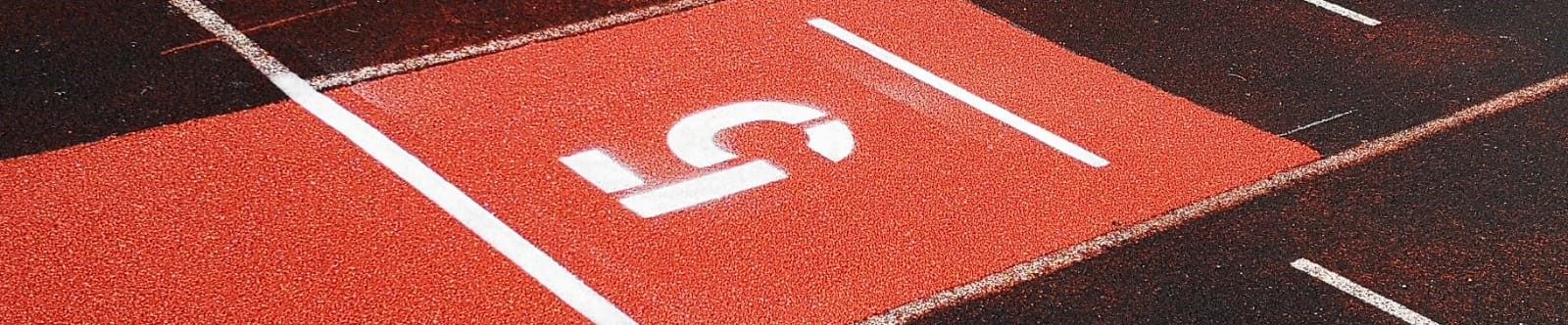 Section of a tartan track shows the number five